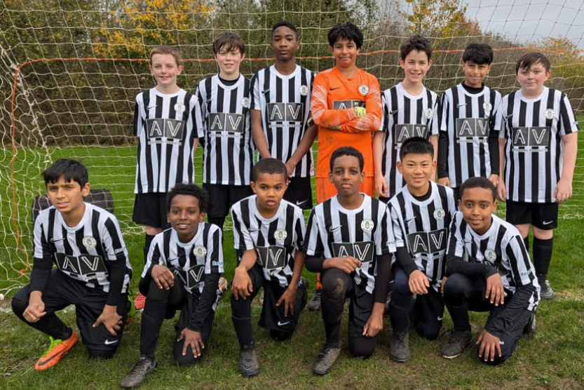 Football team photo with AV Industrial Product's sponsorship on the kit